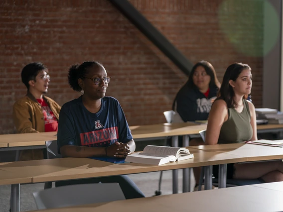 Students sitting at desks in a classroom.