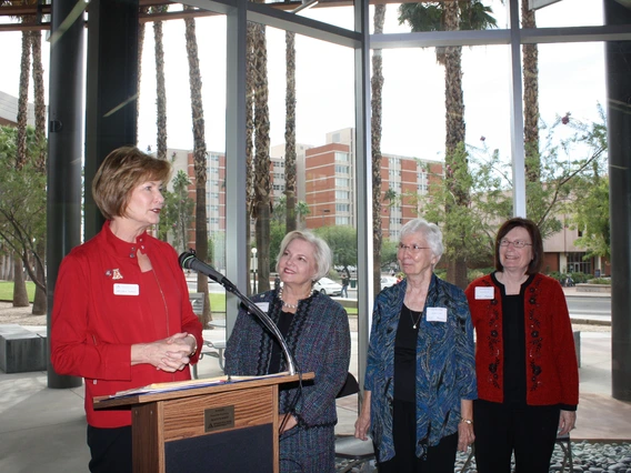 Melinda Burke giving an award to the Council