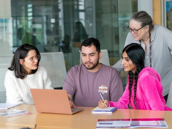 Picture of students in front of computer