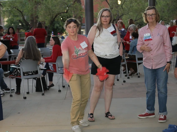 Wildcats play a cornhole game outside Mclelland Park